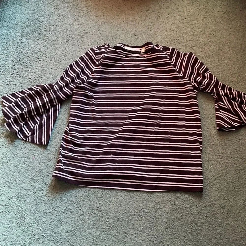 Black and white striped top with fancy sleeves